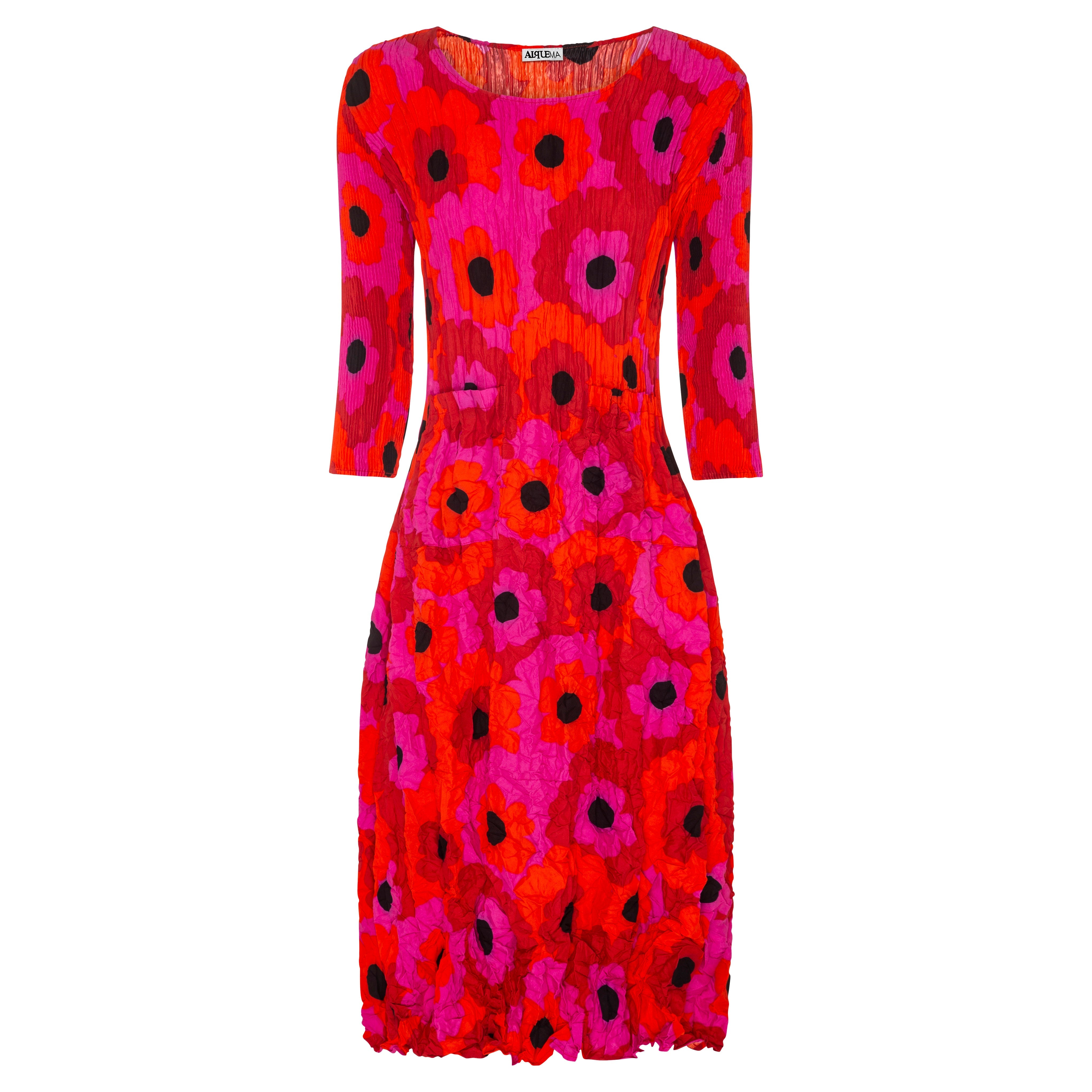 A red and multicolor floral print dress with 3/4 sleeves and a round neckline.